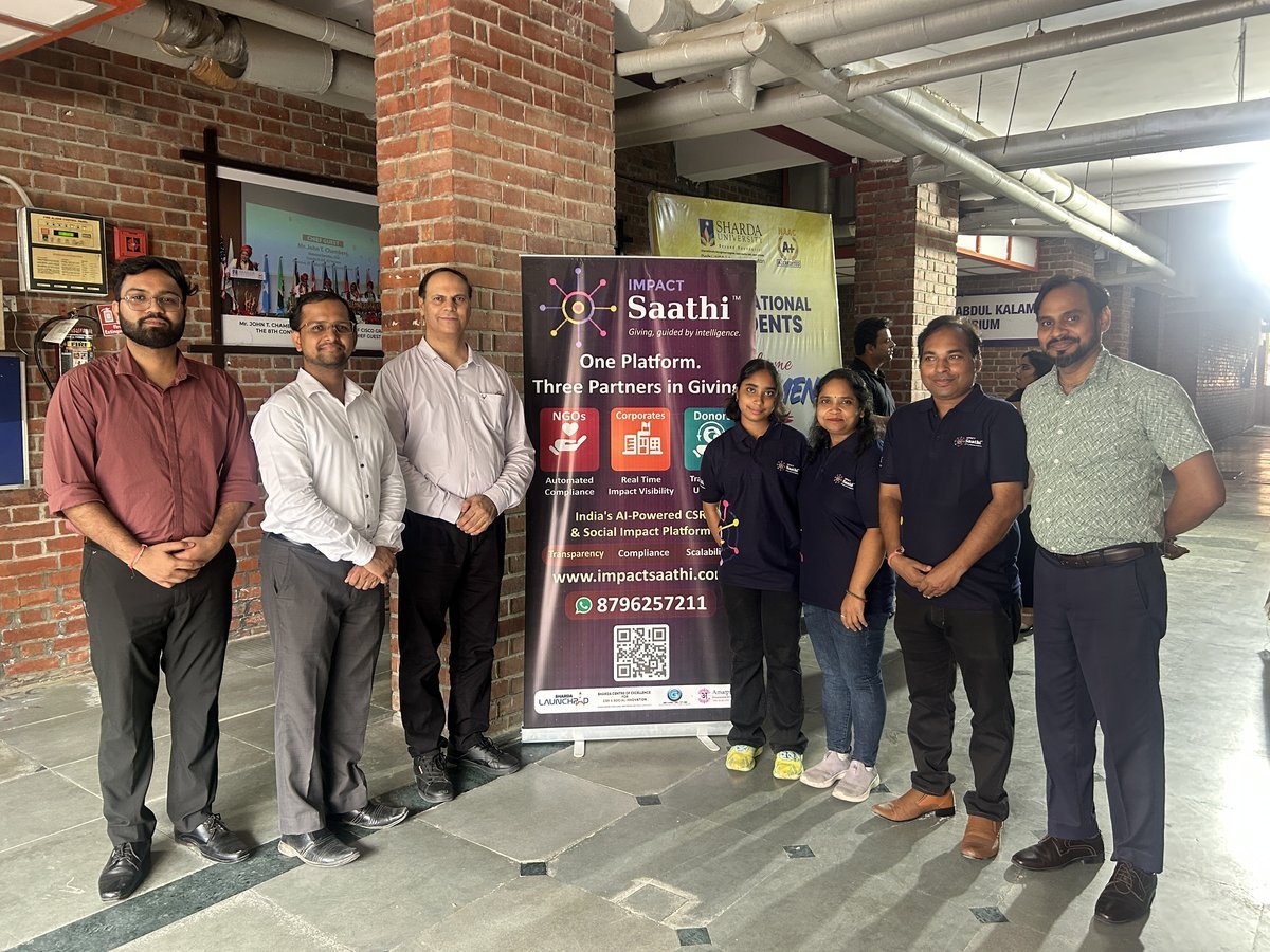 Team with rollup banner