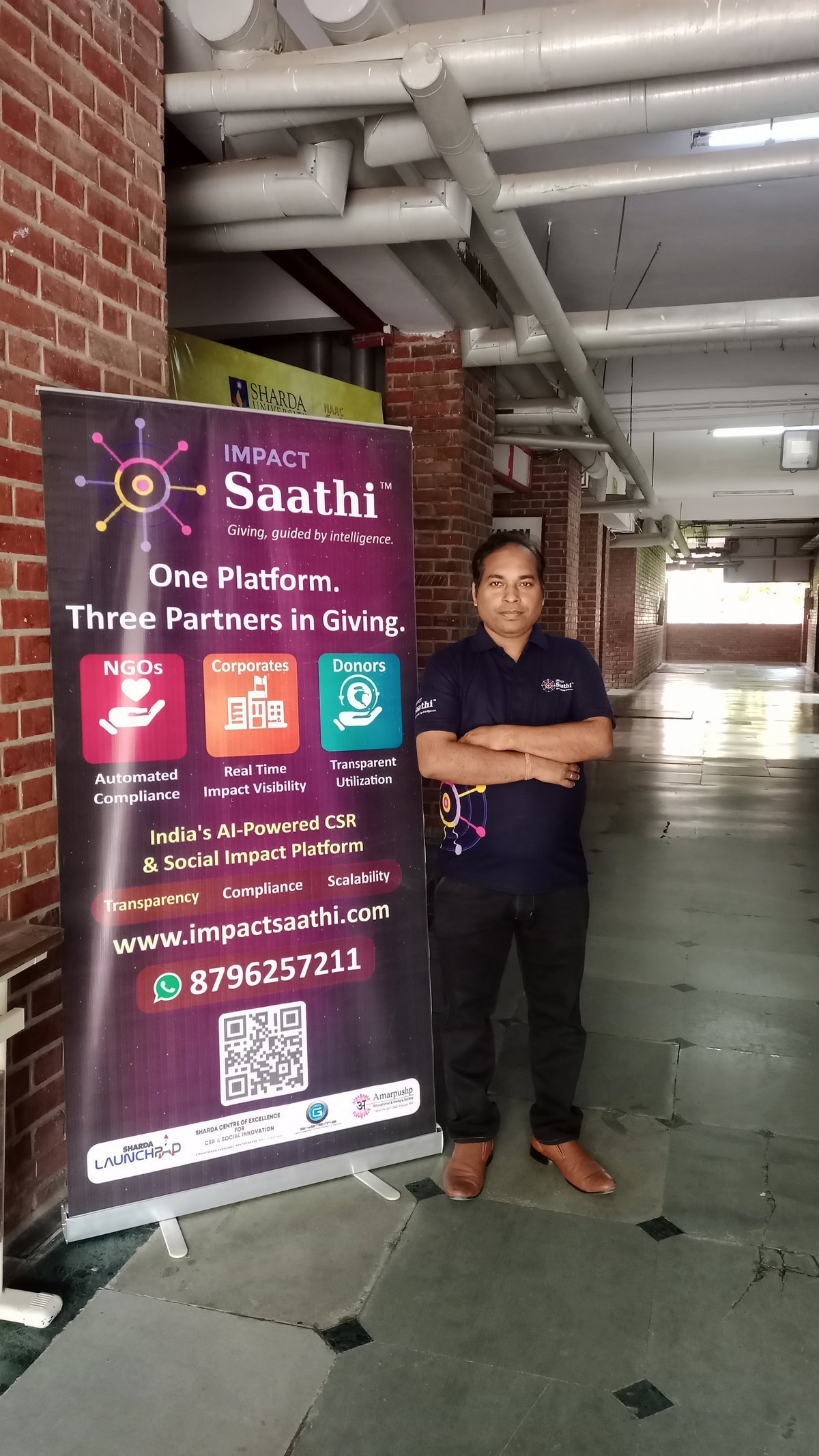 Ashish with banner